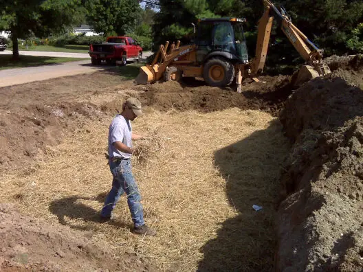 NEW DRAIN FIELD BEING INSTALLED